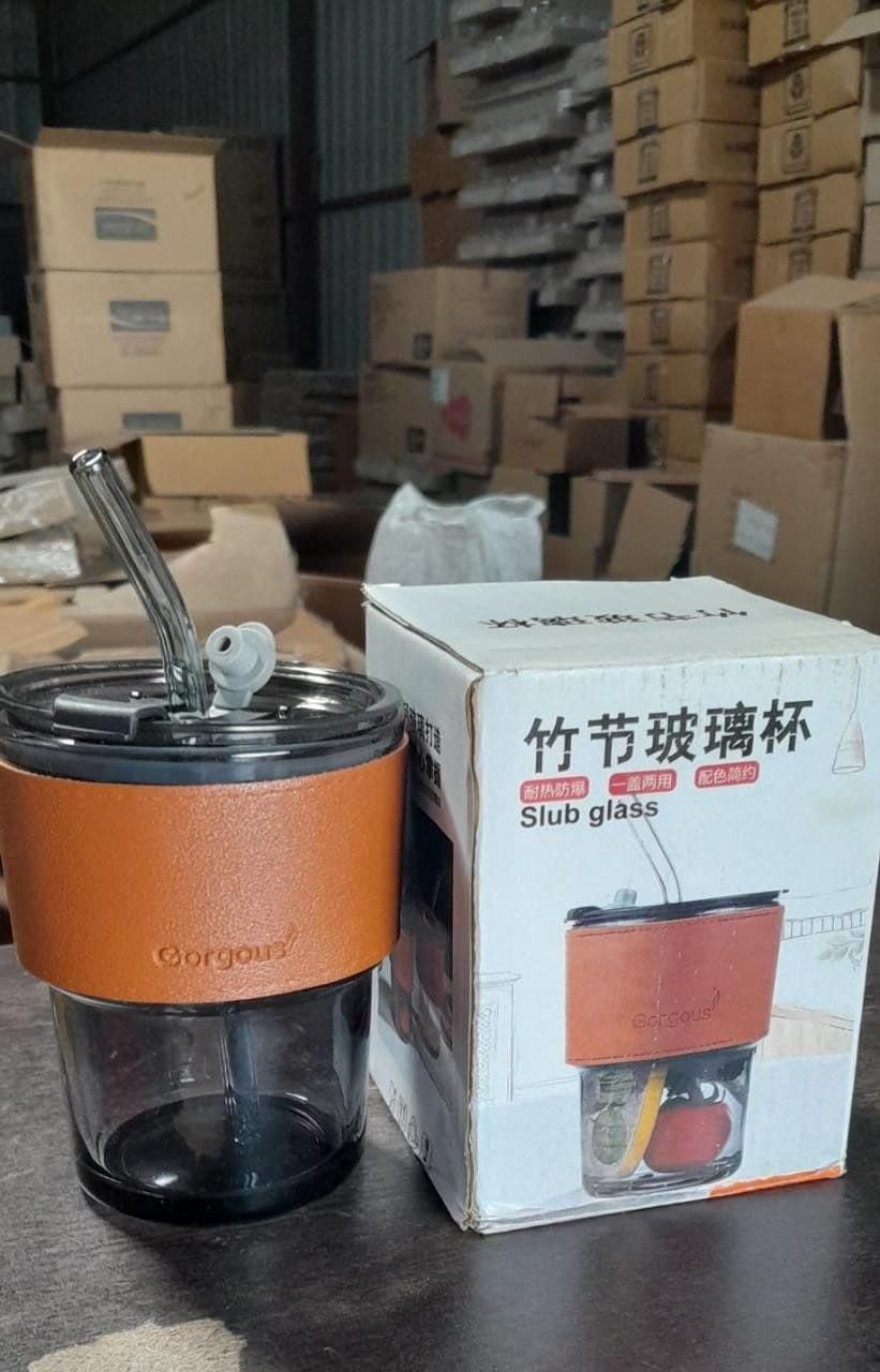 Leather grip glass water bottle with straw